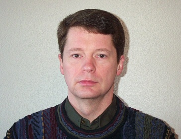 non-smiling mug shot