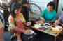 Indonesia ladies working with beads